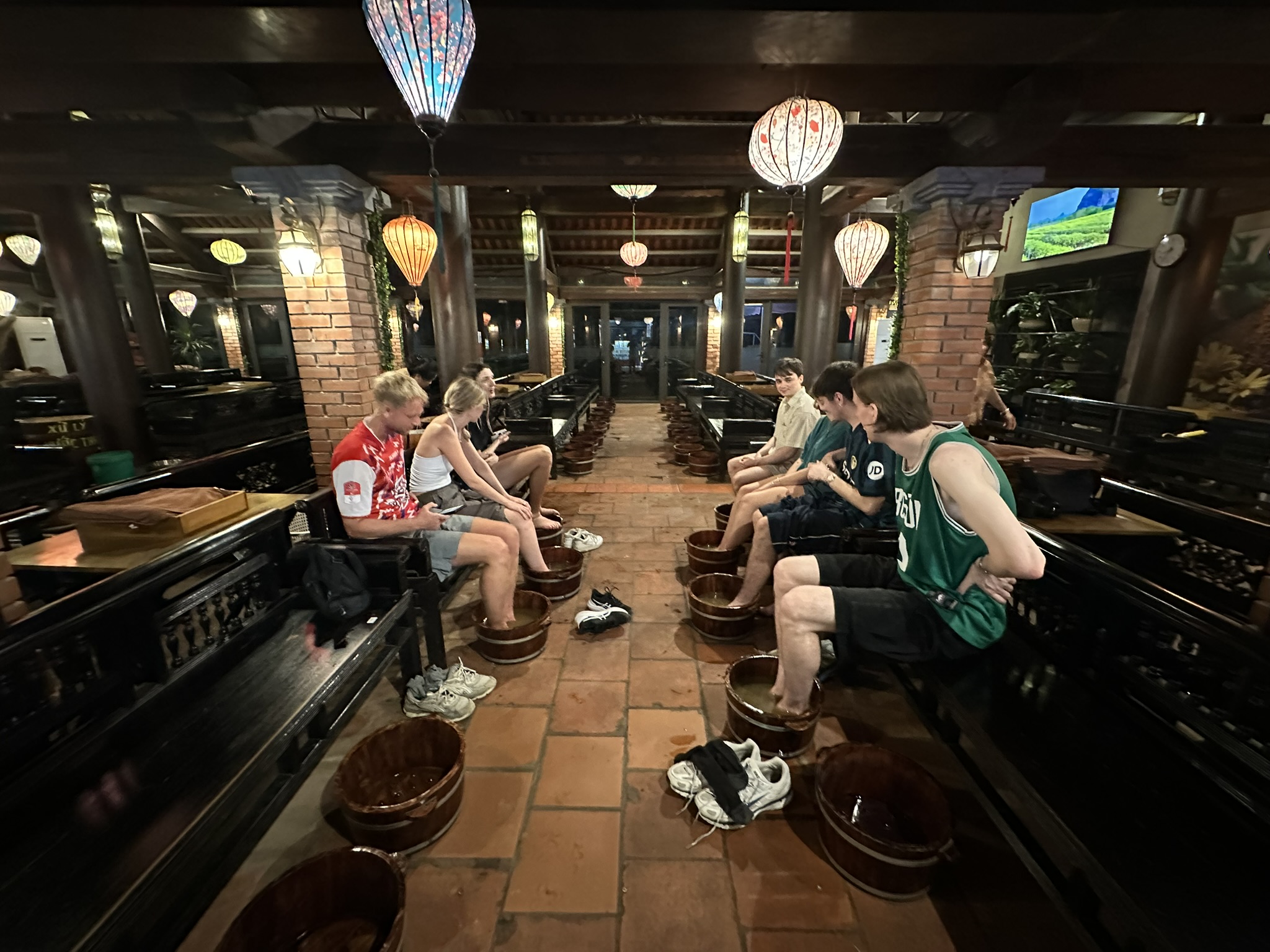 Reflections of light on the temple's dark water features